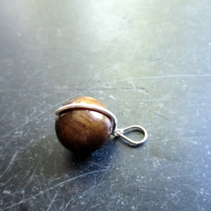 Pendant, tiger eye, ball, sterling silver, brown, unisex
