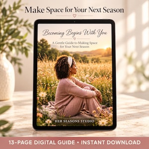 May include: A digital tablet displaying a guide titled Becoming Begins With You: A Gentle Guide to Making Space for Your Next Season. The cover features a person sitting in a field of wildflowers at sunset. The text Her Seasons Studio is at the bottom.