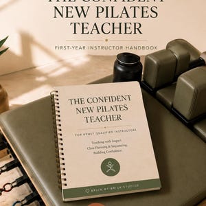May include: A spiral-bound handbook titled The Confident New Pilates Teacher for newly qualified instructors. The cover is beige with dark green text and a circular logo featuring a flower icon. It includes the text Teaching with Impact, Class Planning & Sequencing, Building Confidence, and Brick by Brick Studios.