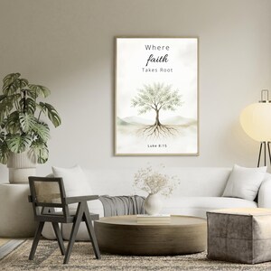 May include: A rectangular wall art print in a light wood frame featuring a watercolor illustration of a tree with visible roots. The text reads Where faith Takes Root and Luke 8:15 in black lettering against a soft beige and white background.