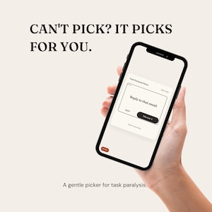 May include: A smartphone displaying a Task Paralysis Picker app interface with the text 'Reply to that email' and 'This one'. The screen also shows 'CAN'T PICK? IT PICKS FOR YOU.' and 'A gentle picker for task paralysis.' in dark brown text.
