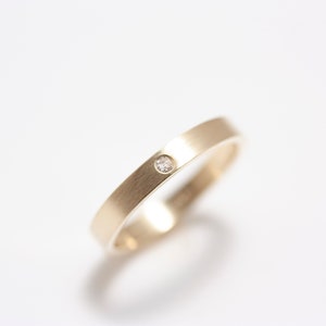 14k Gold Flush Set Diamond Band