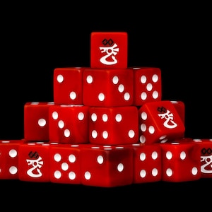 May include: A pyramid-shaped stack of red six-sided dice against a black background. Each die features white pips and a white dragon-like symbol on one face. The dice are arranged in a tiered formation with one die at the top and several below.