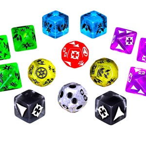 May include: A collection of fourteen multi-sided gaming dice in various colors including green, blue, red, yellow, purple, black, and clear. Each die features distinct black or white symbols, including crosses, stars, and geometric shapes on their faces.