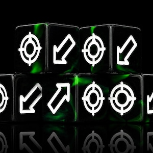 May include: A set of six black dice with green marbled accents, each featuring white engraved symbols. The symbols consist of circular target icons and directional arrows pointing in various orientations, arranged in a two-row stack.
