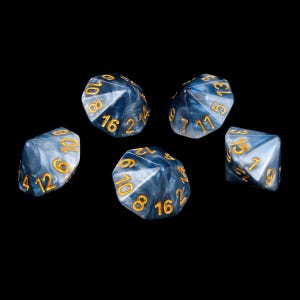 May include: A set of five multi-sided dice featuring a swirling blue and white marbled pattern with recessed gold-colored numbers. Each die has a distinct geometric shape with multiple triangular faces, displaying various numerical values clearly.