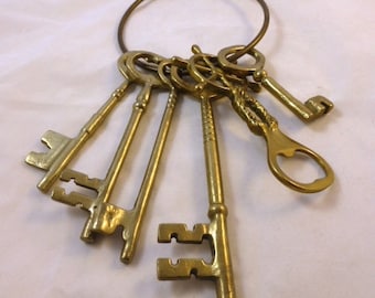 Vintage Hand Wrought Brass Ring With 5 Skeleton Keys and 1 Bottle Opener