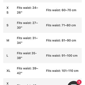 May include: A size chart showing waist measurements in inches and centimeters. Sizes range from XS (24-26 inches, 60-70 cm) to XXL (43-46 inches, 111-120 cm). The chart is on a white background.