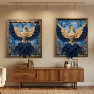 May include: Two framed wall art pieces featuring a three-dimensional phoenix with a cream-colored body and dark blue wings and tail feathers. The background of each piece displays a swirling blue pattern with small red floral accents.