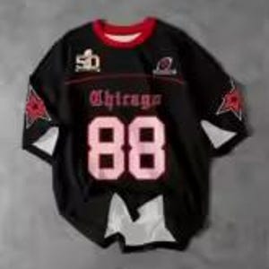 May include: Black football jersey with the word "Chicago" in pink gothic lettering and the number "88" in pink. The jersey has red and white accents, with star designs on the sleeves. The Super Bowl logo is visible.