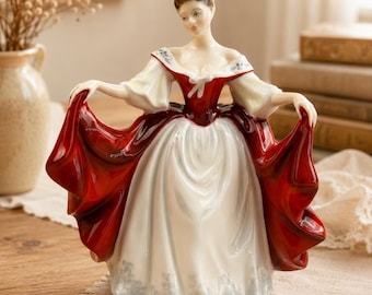 Figura Royal Doulton Sara HN2265, Dama de porcelana fina Peggy Davies, vestido rojo y blanco.