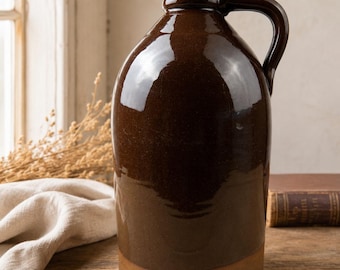 Jarra antigua de gres marrón con tapón de madera, estilo Albany Slip, decoración rústica de granja.