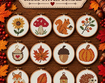 May include: A Fall Cross Stitch Bundle featuring twelve circular wooden embroidery hoops. Each hoop contains a cross-stitched design including a sunflower, mushroom, squirrel, berries, mug, leaf, acorn, pumpkin, fox, leaf, lantern, and hedgehog.