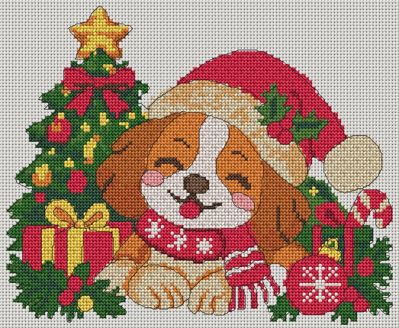 May include: A cross-stitch pattern featuring a brown and white puppy wearing a red Santa hat and a red scarf with white snowflake details. The puppy is surrounded by a green Christmas tree with a yellow star, red gift boxes, and a red ornament.