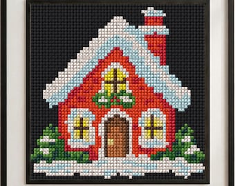 May include: A framed cross-stitch embroidery featuring a red house with a brown door, yellow windows, and a chimney, covered in white snow against a black background, flanked by green bushes and set within a simple black frame.