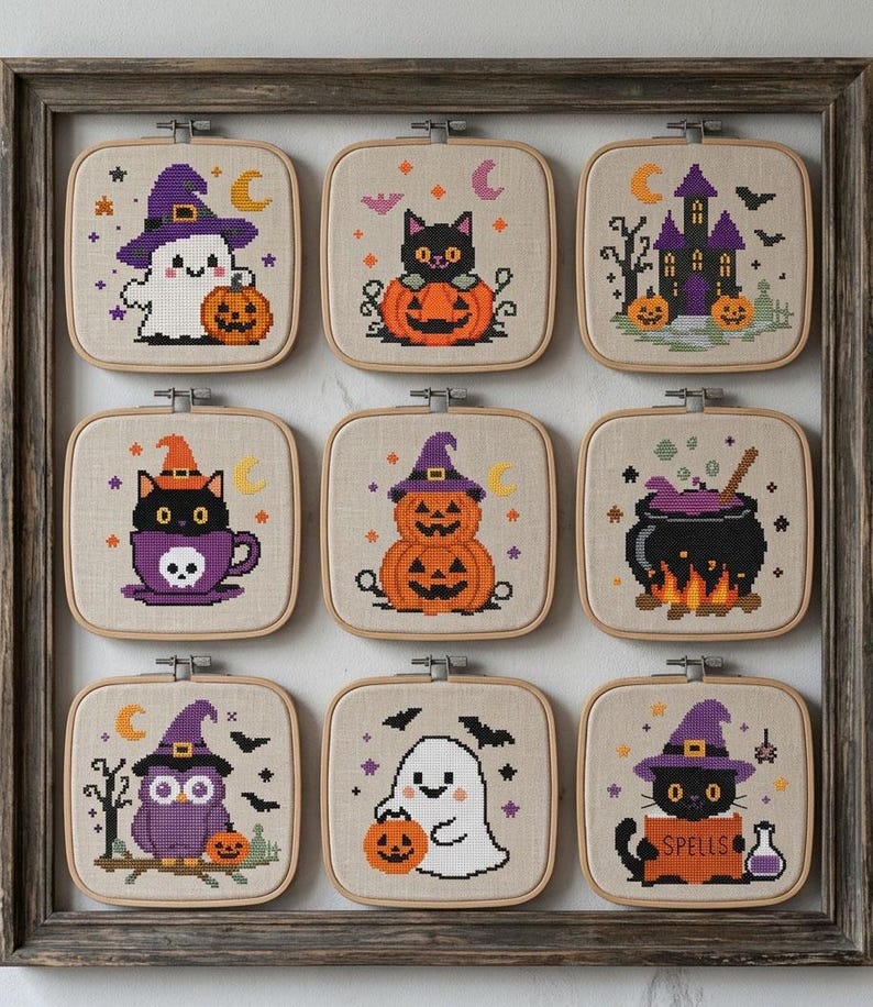 May include: Nine square embroidery hoops featuring Halloween cross-stitch designs on beige fabric, arranged in a grid within a wooden frame. Patterns include ghosts, black cats, pumpkins, a haunted house, a cauldron, and an owl, all in purple, orange, and black.