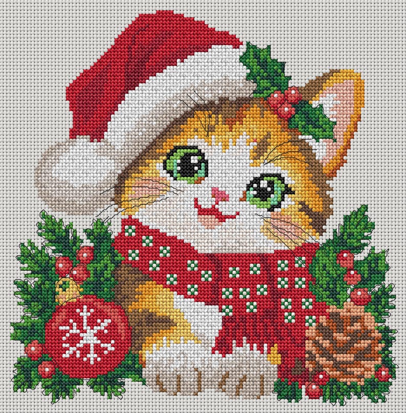 May include: A cross-stitch pattern featuring a kitten wearing a red and white Santa hat and a red scarf with white accents. The kitten is surrounded by green holly leaves, red berries, a red ornament with a white snowflake, and a brown pinecone.