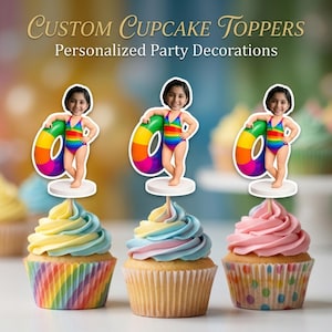 May include: Custom cupcake toppers featuring a personalized photo of a child in a rainbow swimsuit holding a rainbow pool float. The text reads CUSTOM CUPCAKE TOPPERS Personalized Party Decorations. Three cupcakes with colorful frosting are shown.