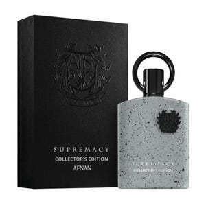 Puede incluir: Frasco y caja de perfume Afnan Supremacy Collector's Edition. El frasco es gris con motas negras y un tap&oacute;n negro. La caja es negra con texto en relieve y un logotipo. El texto en la caja y el frasco dice "SUPREMACY COLLECTOR'S EDITION AFNAN."