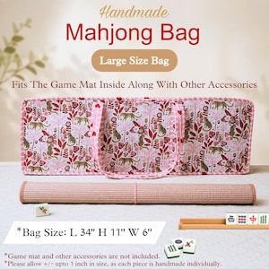 May include: A rectangular handmade Mahjong bag featuring a pink and white leopard and floral print with matching handles. The bag measures 34 inches long, 11 inches high, and 6 inches wide. A rolled game mat and several Mahjong tiles are visible.