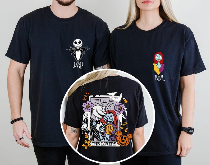 May include: Two black t-shirts featuring chest graphics of Jack Skellington labeled DAD and Sally labeled MUM. A circular inset shows the back of a black t-shirt with a tarot card graphic of Jack and Sally titled THE LOVERS with pumpkins.