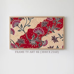 May include: A framed artwork featuring a floral pattern in shades of red, burgundy, and cream. The design includes stylized flowers and leaves with black outlines, set against a textured background. The frame is made of light-colored wood.