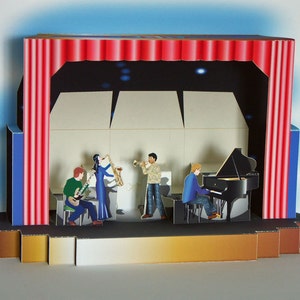 May include: A pop-up card depicting a jazz band on stage. The stage has red curtains, and the band includes a pianist, saxophonist, guitarist, and trumpeter. The background is a dark blue with white accents.