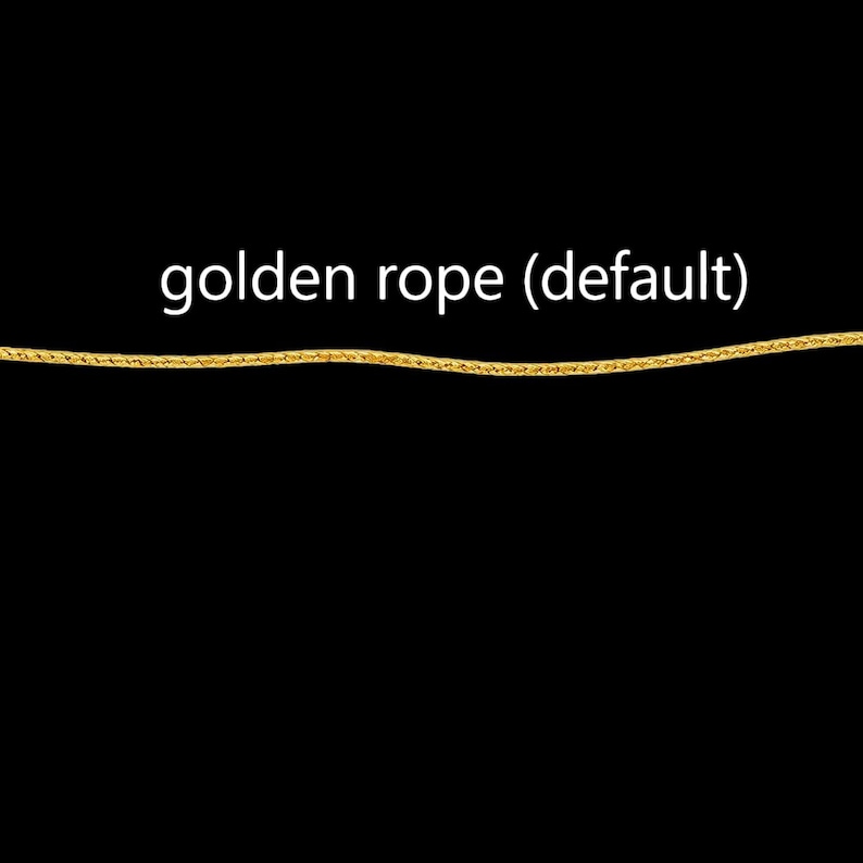 May include: A thin, horizontal golden rope chain with a textured, metallic finish. The text "golden rope (default)" is printed in white above the chain against a solid black background, clearly identifying the item as a golden rope chain.