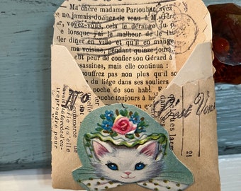 Vintage envelope with vintage French paper and trim
