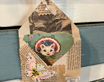 Vintage envelope with vintage French paper and trim