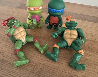 Lotto di 4 action figure vintage delle Tartarughe Ninja (TMNT).