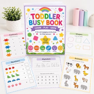 Könnte beinhalten: Ein Beschäftigungsbuch für Kleinkinder mit einem bunten Einband, der einen Regenbogen, Sterne und den Text 'TODDLER BUSY BOOK LEARN PLAY GROW' zeigt. Um das Buch herum liegen fünf Arbeitsblätter mit Übungen zu Farben, Formen, Zahlen und Tieren.