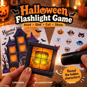 Op de afbeelding: Een Halloween zaklamp-spelset met een geprint spookhuis, een vel met karakter-iconen en een zaklamp. Het spel bevat een uitgesneden raamkozijn dat het silhouet van Frankenstein toont wanneer het wordt verlicht door de zaklamp.