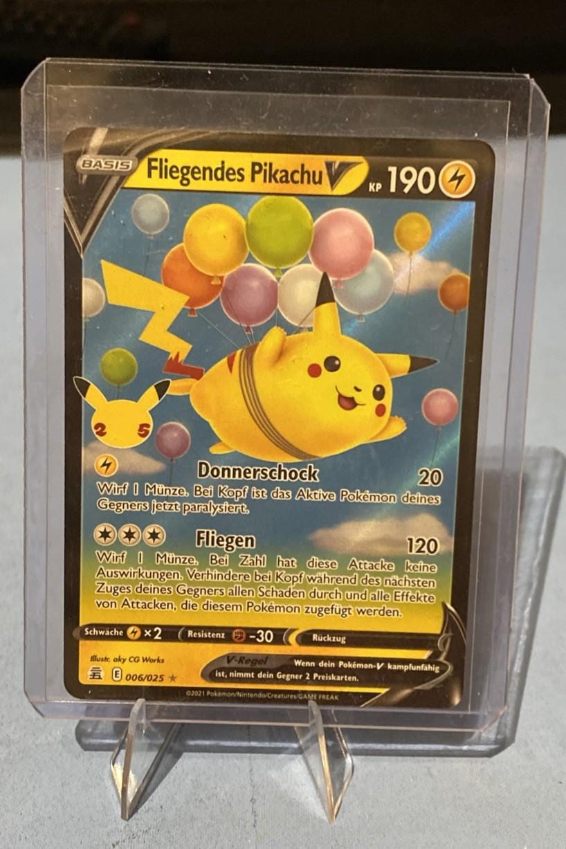 flying pikachu v pokemon card value Pokmon TCG  Piece Of The Game clear acrylic holder that perfectly accentuates the stunning visual design and character artwork 2021 Pokmon Celebrations Flying Pikachu