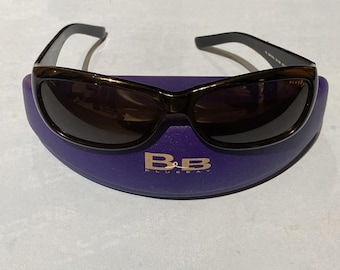 Gafas de sol unisex estilo ojo de gato BLU 130 Safilo - Polarizadas con protección UV400, elegante montura negra y lentes moradas