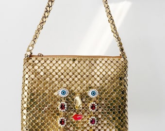Ode to the master crybaby gold mesh purse