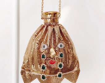 Ode to the master crybaby gold mesh accordion purse