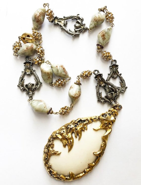 Gorgeous beaded necklace and brass brutalist penda
