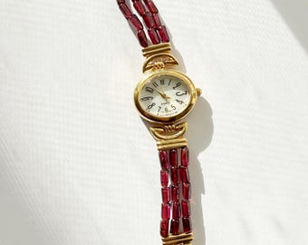 Reloj vintage con cuentas