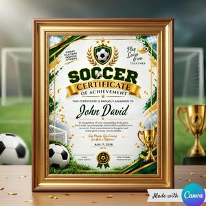 May include: A framed soccer certificate of achievement with gold and green accents. The text reads Soccer Certificate of Achievement, John David, Great Players Inspire Others, Play Learn Grow Together, and Aug 17, 2026, with soccer ball and trophy graphics.