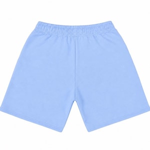 May include: Light blue shorts with an elastic waistband. The shorts are made of a soft material and have a simple, classic design. The shorts are a solid color and are suitable for casual wear.