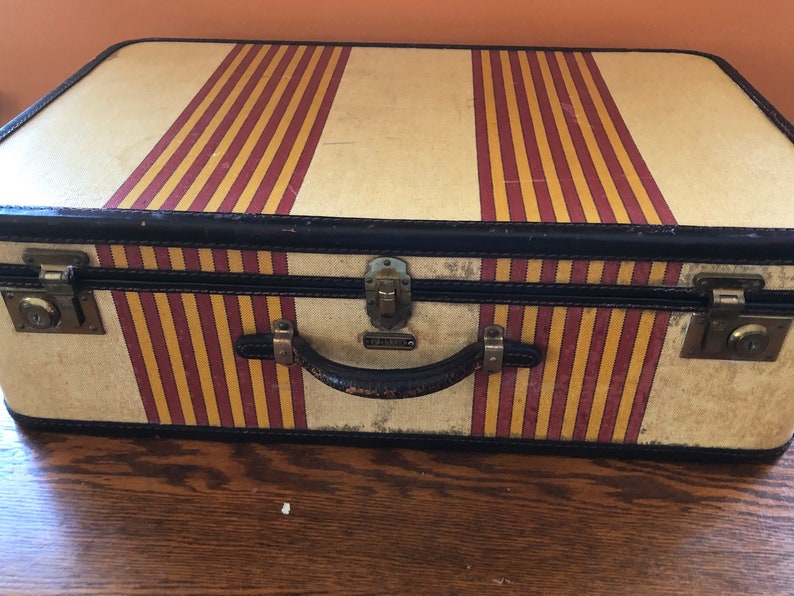 Vintage Oshkosh Stripped Luggage