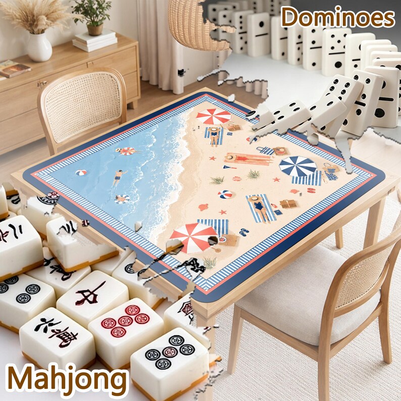 May include: A square table featuring a beach-themed mat with illustrations of people, umbrellas, and towels on sand and water. The table is surrounded by white mahjong tiles with black and red symbols and a set of white dominoes with black dots.