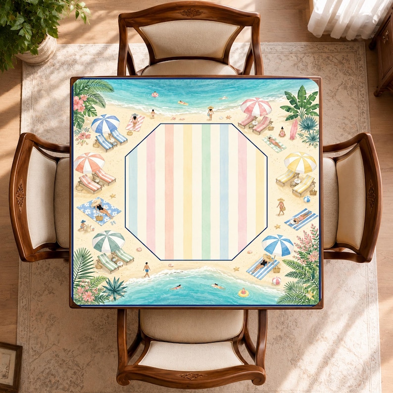May include: A square tabletop featuring a central octagonal panel with vertical pastel stripes in pink, yellow, green, and blue. The border displays a beach scene with sand, turquoise ocean water, palm trees, colorful umbrellas, and lounge chairs.