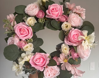 Artificial floral wreath