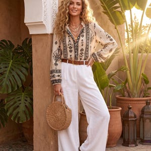 Camicia da donna in stile boho con stampa floreale – Top casual a maniche lunghe con bottoni e scollo a balze; Blusa stampata dalla vestibilità ampia