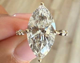 Verlobungsring mit 4 Karat im Marquise-Schliff geschliffenem, im Labor gezüchtetem Diamanten, 14 Karat Gelbgold-Pavé-Ringband, IGI-zertifiziert.
