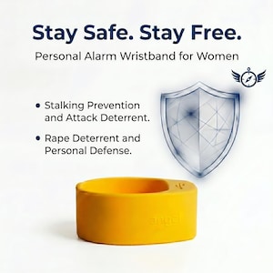 May include: A yellow silicone wristband with the word angel embossed on the side and a small USB icon. The text reads Stay Safe. Stay Free. Personal Alarm Wristband for Women, Stalking Prevention and Attack Deterrent, and Rape Deterrent and Personal Defense.