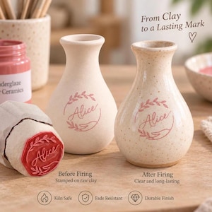 May include: Two small ceramic vases with a stamped design featuring the name Alice inside a circular wreath held by a hand. One vase is matte raw clay, the other is glazed and speckled. A red rubber stamp with the same design is shown nearby.
