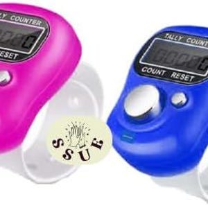 May include: Two digital tally counters, one pink and one blue, each with a white wrist strap. The counters display "00000" on a small screen and have "TALLY COUNTER" and "COUNT RESET" printed above and below the display.